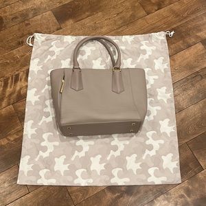 Great condition size 13” Dagne Dover laptop purse. Blush/tan color inc. Dustbag